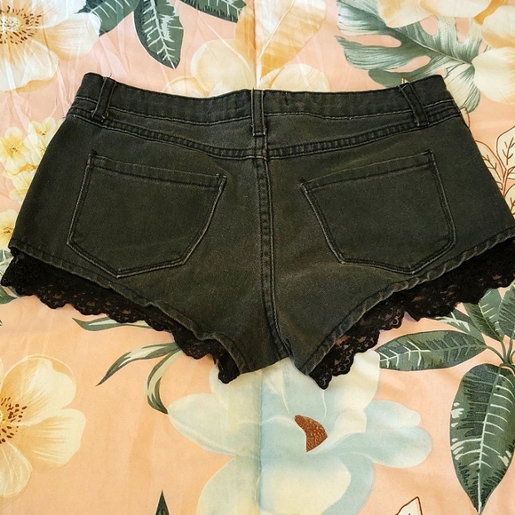 Black denim, black lace booty shorts. - Picture 2 of 4